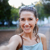 files/2585988-selfie-young-woman-and-casual-in-park-walking-and-smile-for-fun-balance-and-happiness.-portrait-female-and-lady-with-joy-summer-and-chilling-outdoor-cheerful-and-freedom-on-br.jpg